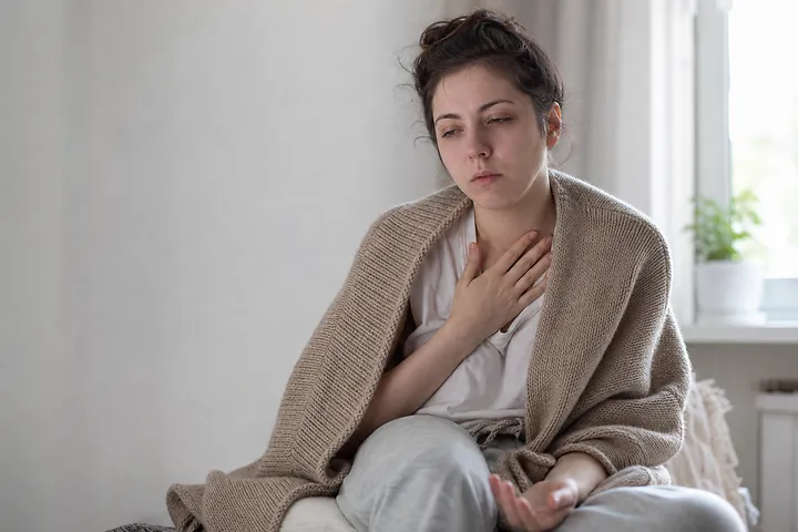 Woman tired and pale showing iron deficiency symptoms